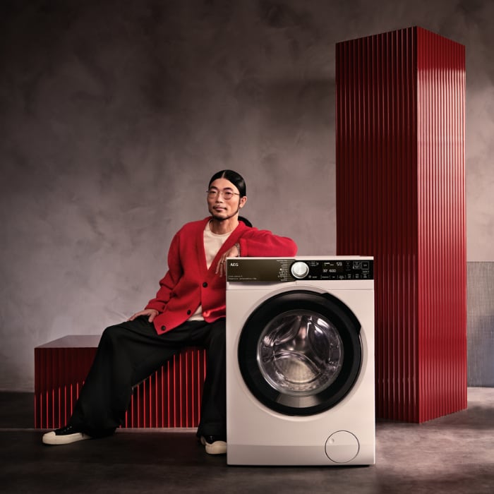 Man next to washing machines