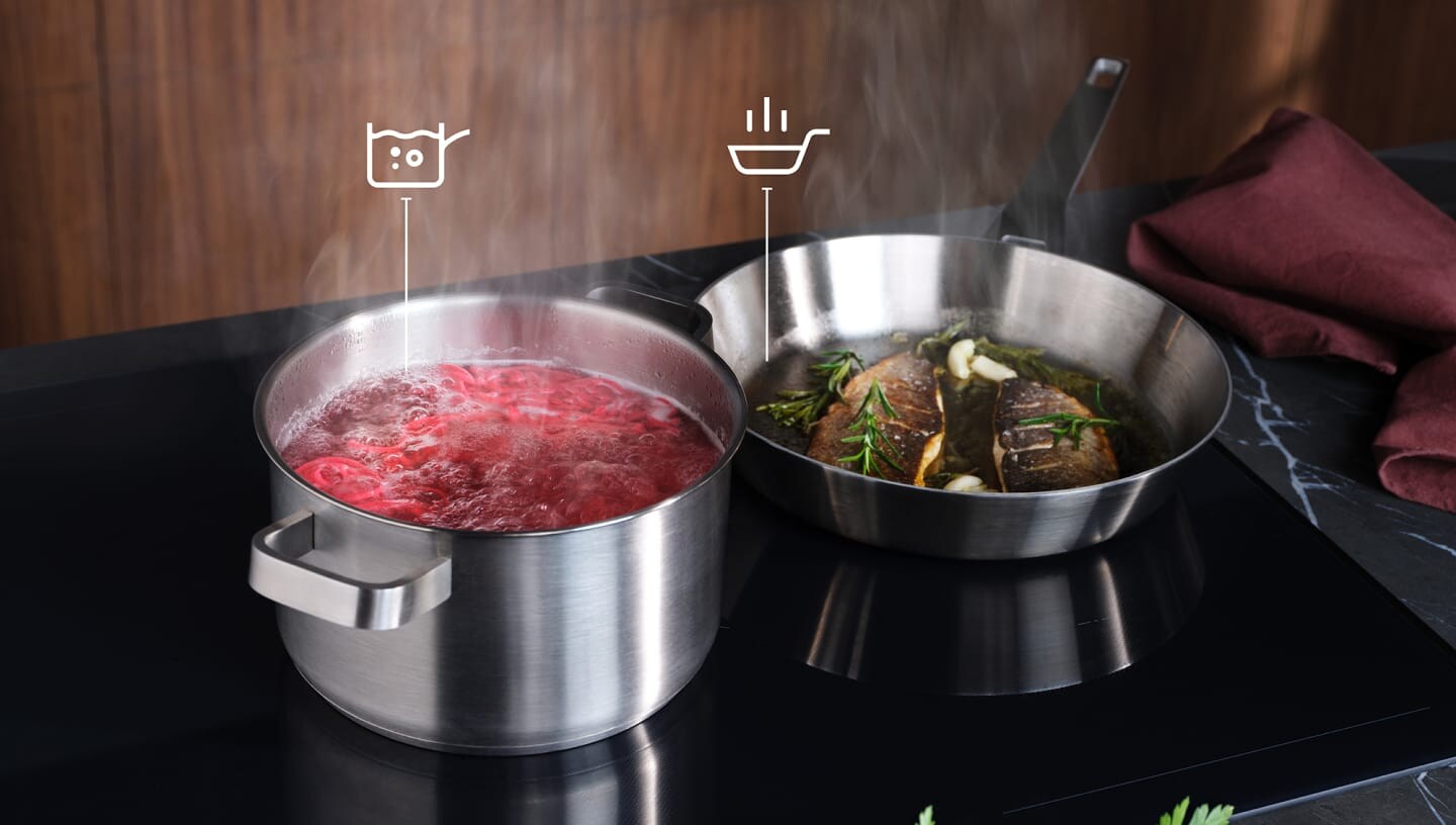 Il cibo viene preparato su un piano cottura a induzione con la funzione SenseBoil and Fry.