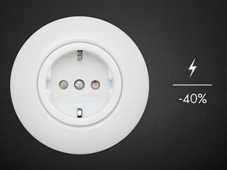 Schema di una presa di corrente che indica la quantità di energia che si può risparmiare con una lavasciuga AEG